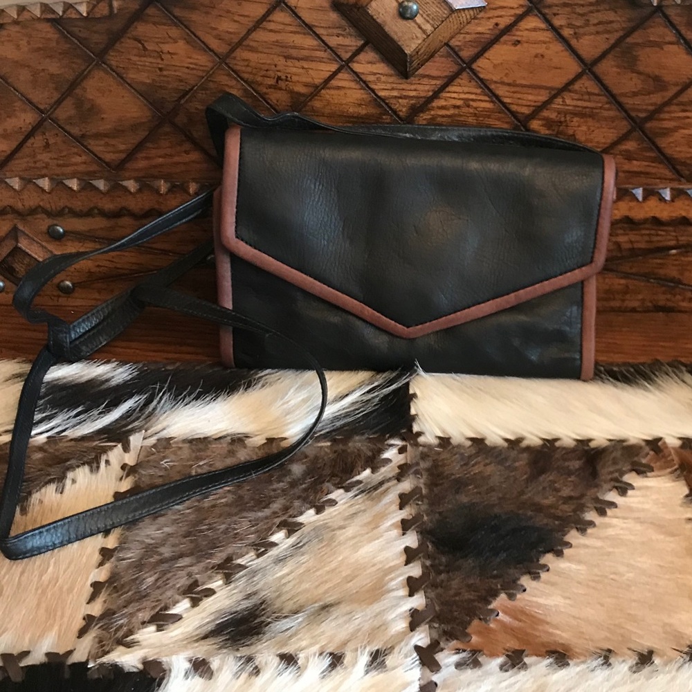 NWT WATER PROOFED LEATHER BAG. NEW LISTING